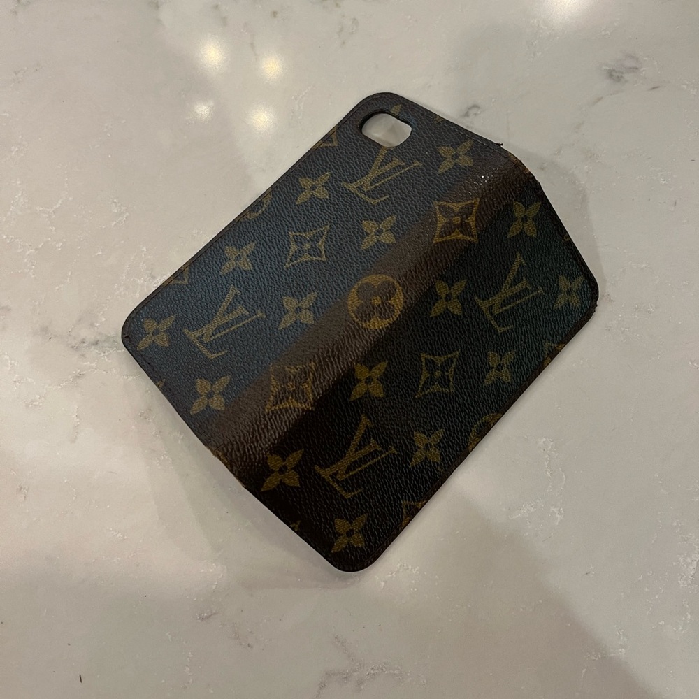 Authentic Louis Vuitton I phone case. I believe it’s for an I phone 8?